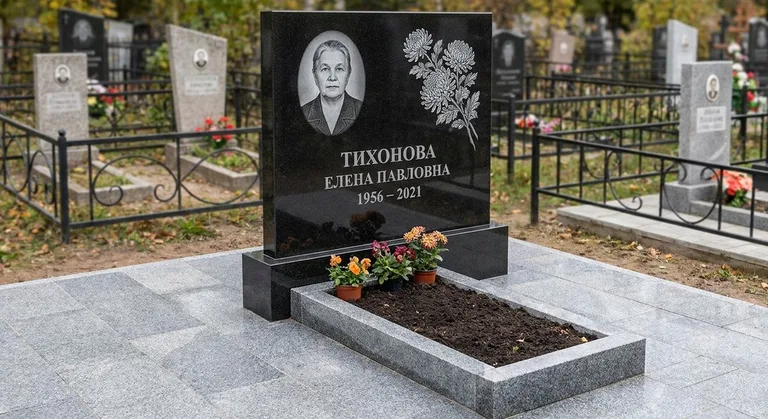 Памятник с гравировкой хризантем — выполненная работа «Тихонова» в Салехарде