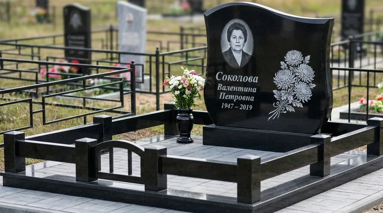 Памятник с гравировкой хризантем — выполненная работа «Соколова» в Салехарде