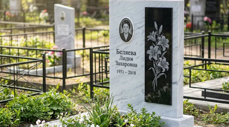 Памятник с гравировкой лилий — выполненная работа «Беляева» в Салехарде
