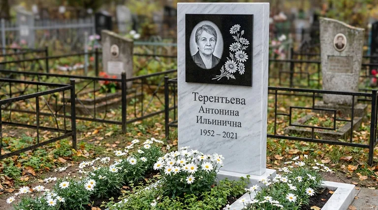 Памятник с гравировкой ромашек — выполненная работа «Терентьева» в Салехарде