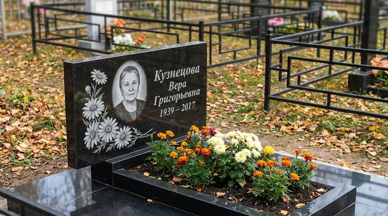Памятник с гравировкой ромашек — выполненная работа «Кузнецова» в Салехарде
