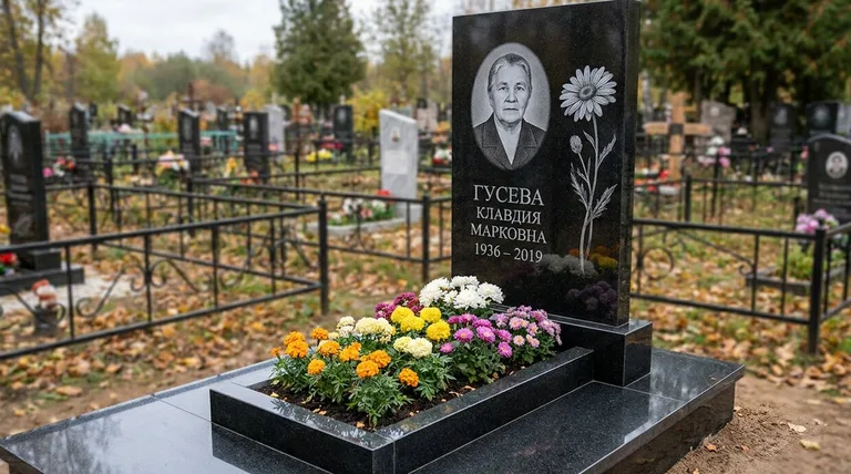 Памятник с гравировкой ромашек — выполненная работа «Гусева» в Салехарде