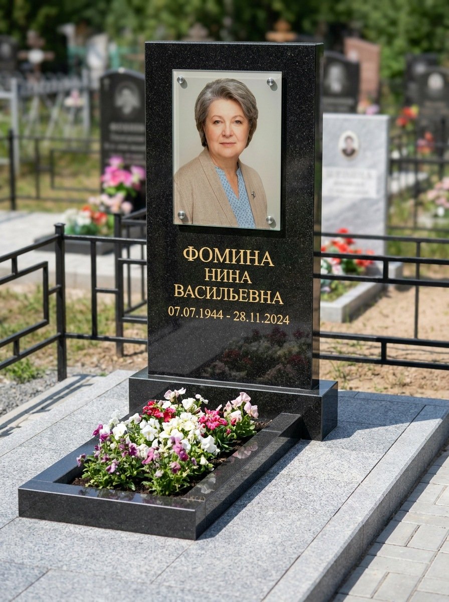 Портрет на памятнике в Салехарде — Цветной портрет, вплавленный в стекло, на чёрном граните